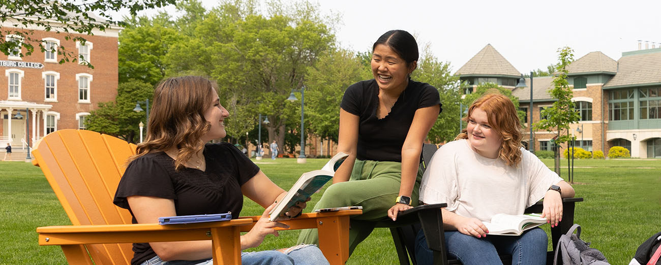 Students sitting on the campus mall