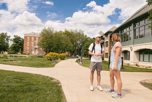 Students chatting in front of the student center