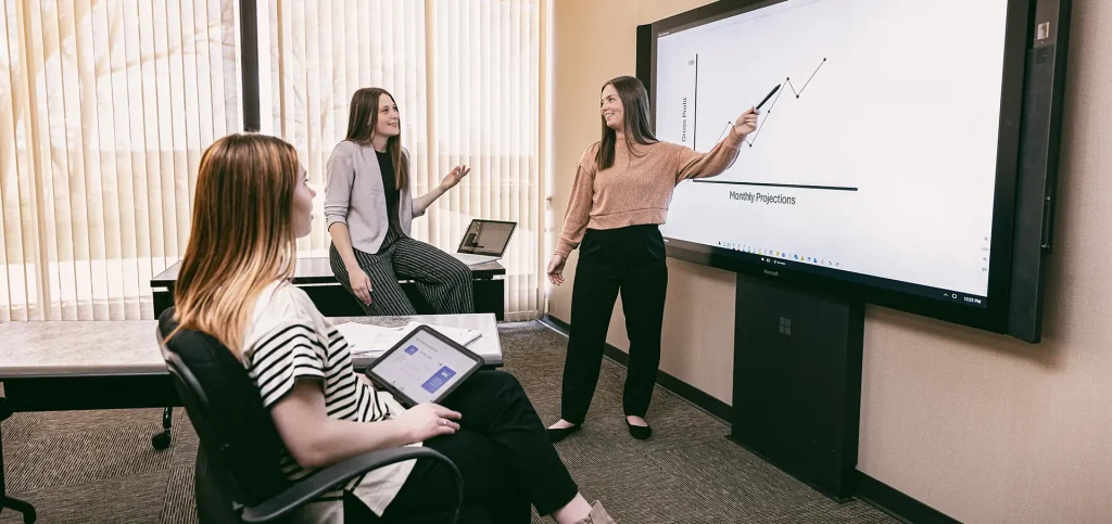 Student presenting in a business environment
